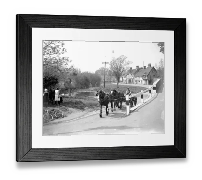 Framed Print : A man drives his cart pulled by shire horses through Eynsford, Kent. 1934 Framed Print : A man drives his cart pulled by shire horses through Eynsford, Kent. 1934