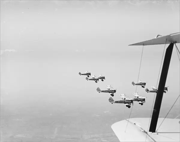 Bristol Bulldogs fighters of No 32 Squadron in formation flying over Biggin Hill