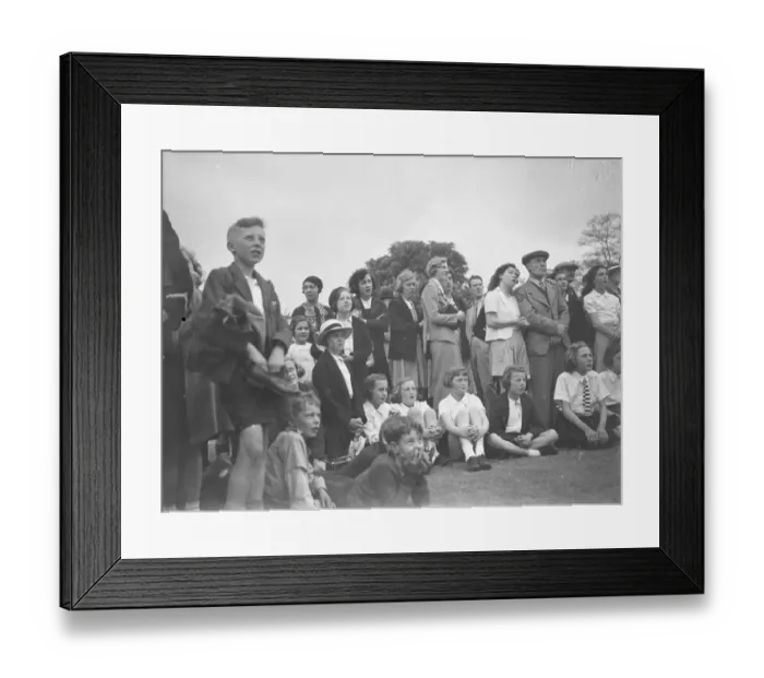 Framed Print : The crowd watching a trapeze artist performing at the Sidcup fete in Kent Framed Print : The crowd watching a trapeze artist performing at the Sidcup fete in Kent