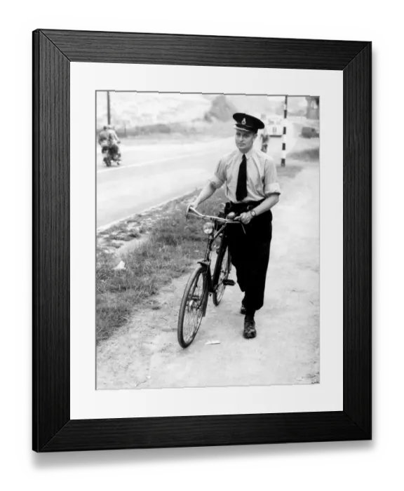 Framed Print : A Kent police officer with his bicycle. 26th July 1952 Framed Print : A Kent police officer with his bicycle. 26th July 1952