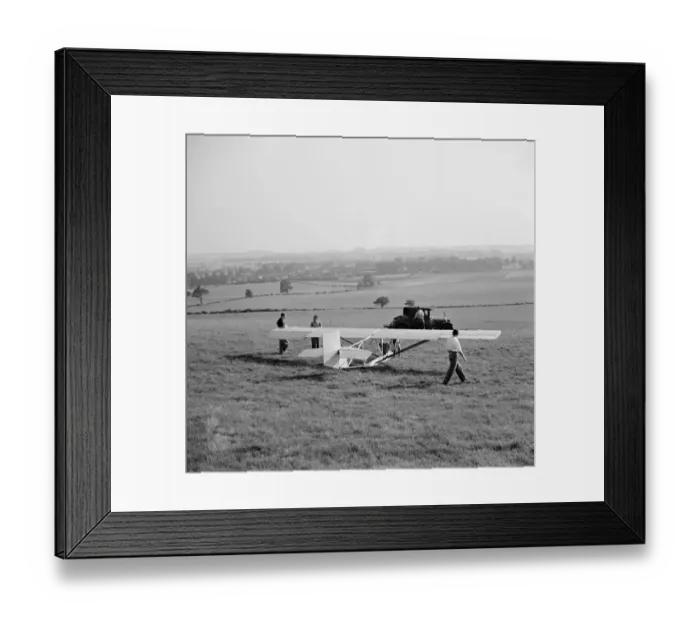 Framed Print : A Cessna CG-2 Glider is being hitched up to its tow line, in preperation for its Framed Print : A Cessna CG-2 Glider is being hitched up to its tow line, in preperation for its