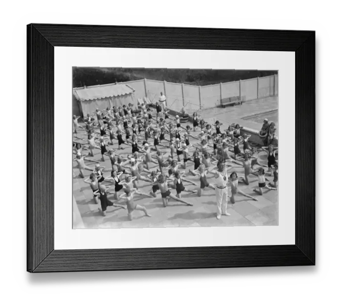 Framed Print : Children performing drills at the Swanscombe Baths in Kent. The instructor is Mr Framed Print : Children performing drills at the Swanscombe Baths in Kent. The instructor is Mr