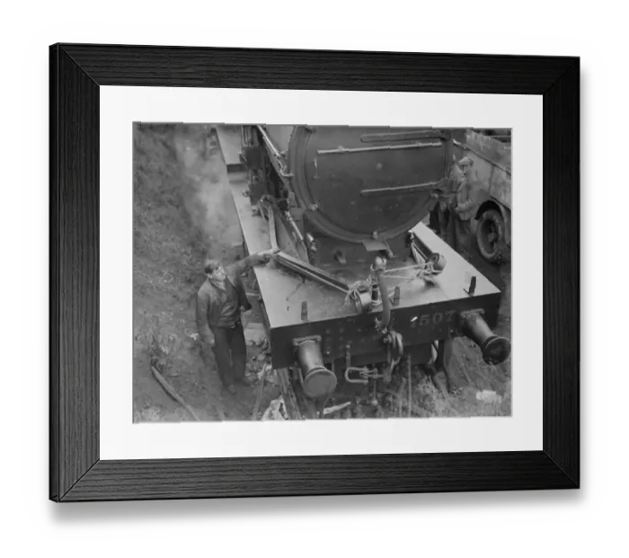 Framed Print : Engineers on the track at the front of the locomotive after being derailed at Swanley