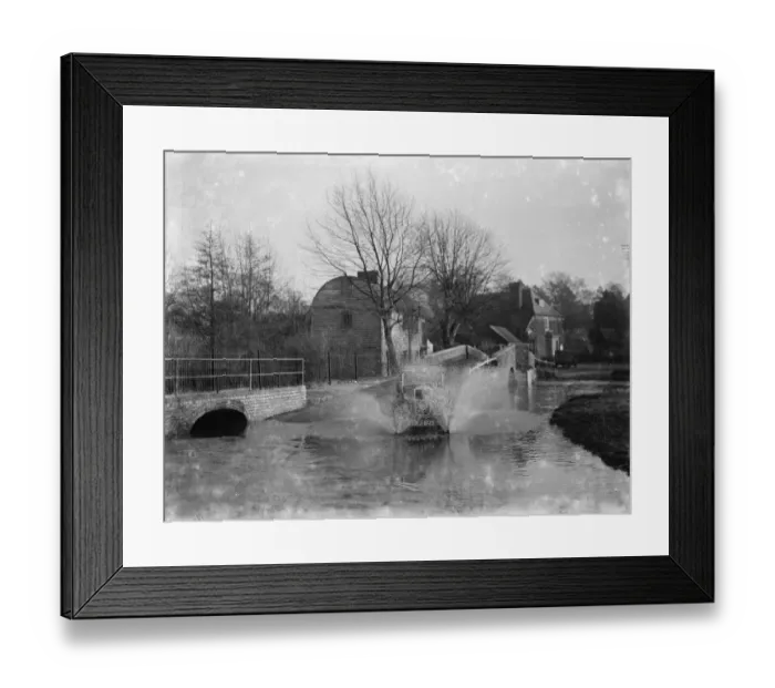 Framed Print : Eynsford Bridge flooded. A car ploughs through the water. 1937
