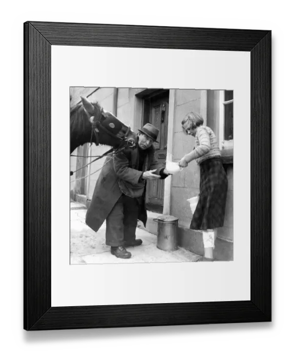 Framed Print : Old milkman and his affectionate horse, delivering milk from a churn in Monmouth, Wales Framed Print : Old milkman and his affectionate horse, delivering milk from a churn in Monmouth, Wales