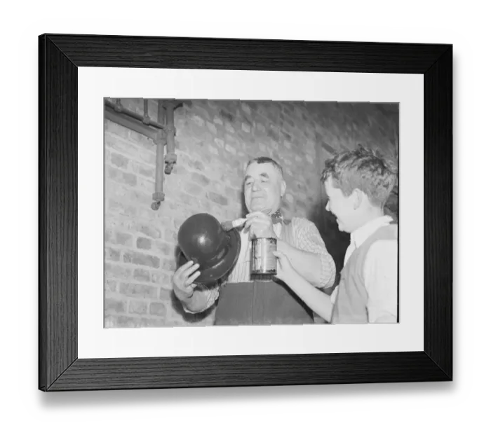 Framed Print : Mr Charlie Hever painting tar onto a bowler hat in Eynsford, Kent. 1937 Framed Print : Mr Charlie Hever painting tar onto a bowler hat in Eynsford, Kent. 1937