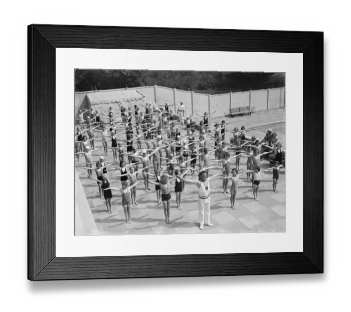 Framed Print : Children performing drills at the Swanscombe Baths in Kent. The instructor is Mr