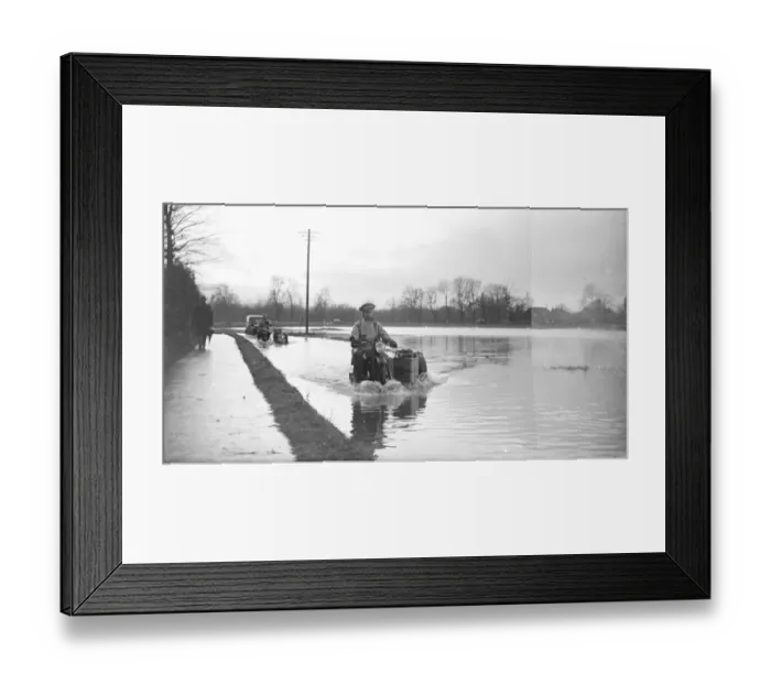 Framed Print : An a Patrolman risks the flooded road on his motorbike. 1936 Framed Print : An a Patrolman risks the flooded road on his motorbike. 1936