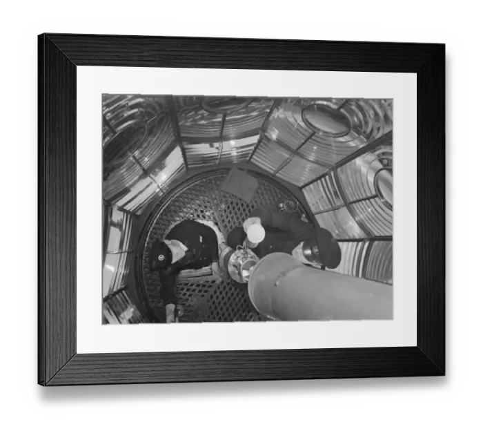 Framed Print : The lighthouse keepers in the light chamber interior of Dungeness lighthouse in Kent Framed Print : The lighthouse keepers in the light chamber interior of Dungeness lighthouse in Kent