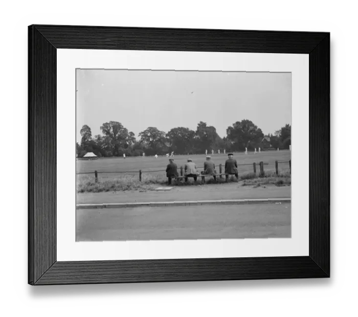 Framed Print : A group of men watch a cricket game in Chislehurst. 1939 Framed Print : A group of men watch a cricket game in Chislehurst. 1939
