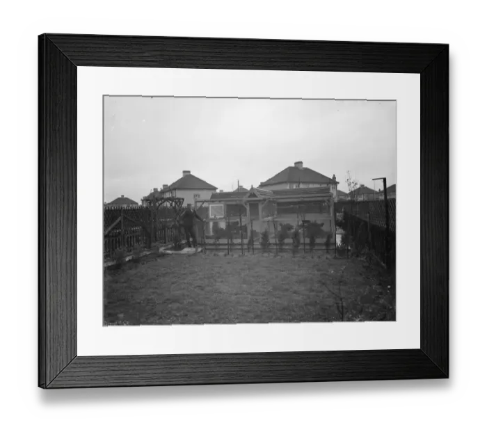 Framed Print : The exterior of Mr R G Halls bird aviary at Bexleyheath with him in his back garden Framed Print : The exterior of Mr R G Halls bird aviary at Bexleyheath with him in his back garden