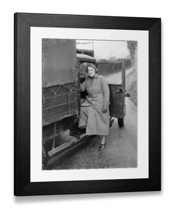 Framed Print : Mrs E Butcher climbs into ans Butcher Carrier Bedford lorry from Wrotham, Kent