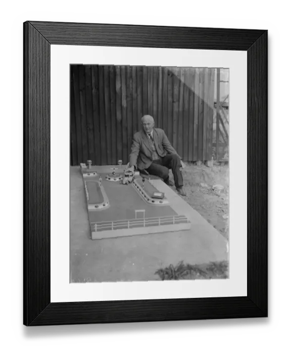 Framed Print : Mr J Ratcliff with a model of Wren Road in Sidcup, Kent. 12 April 1938 Framed Print : Mr J Ratcliff with a model of Wren Road in Sidcup, Kent. 12 April 1938