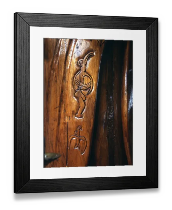 Framed Print : Easter Island - Birdman cult - Birdman carvings on the wooden statue of a Christian Framed Print : Easter Island - Birdman cult - Birdman carvings on the wooden statue of a Christian