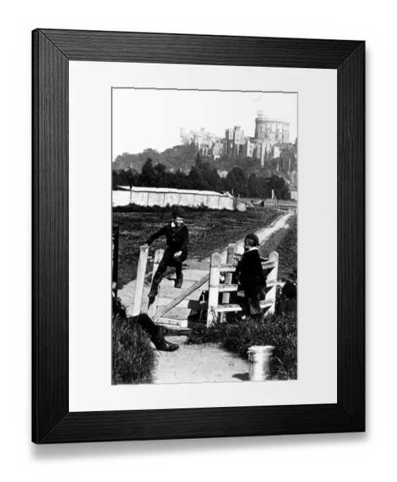 Framed Print : Four young boys playing games by the kissing gate with Windsor Castle in the background Framed Print : Four young boys playing games by the kissing gate with Windsor Castle in the background