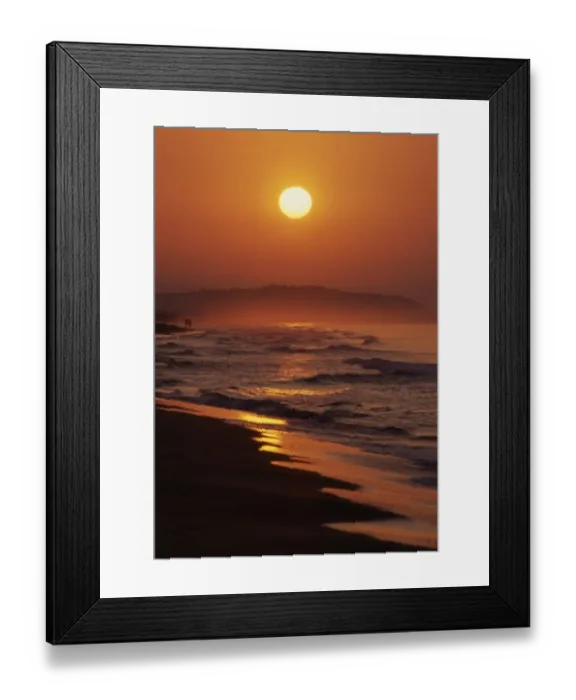 Framed Print : Sunrise over a southern Spanish beach, with a couple in the far distance. An alternative Framed Print : Sunrise over a southern Spanish beach, with a couple in the far distance. An alternative