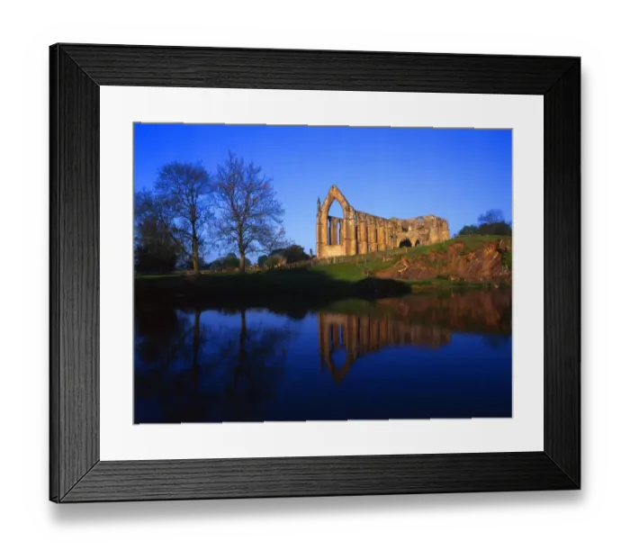 Framed Print : View of the ruins of Bolton Abbey across the river