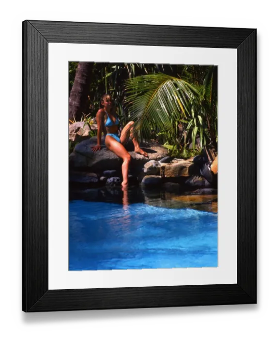 Framed Print : Girl seated by pool in Brampton Island resort, the Great Barrier Reef, Australia Framed Print : Girl seated by pool in Brampton Island resort, the Great Barrier Reef, Australia