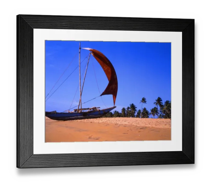 Framed Print : Traditional boat drawn up on the beach at Negombo Framed Print : Traditional boat drawn up on the beach at Negombo