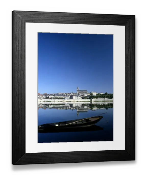 Framed Print : A rowing boat on the river at Blois, Loire Valley, France Framed Print : A rowing boat on the river at Blois, Loire Valley, France