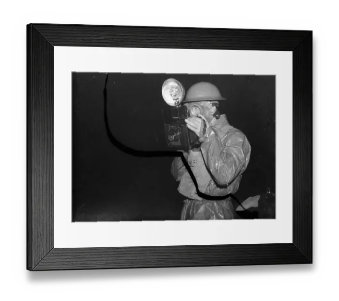 Framed Print : A press photographer in a ARP ( Air Raid Precautions ) gas suit, taking pictures Framed Print : A press photographer in a ARP ( Air Raid Precautions ) gas suit, taking pictures