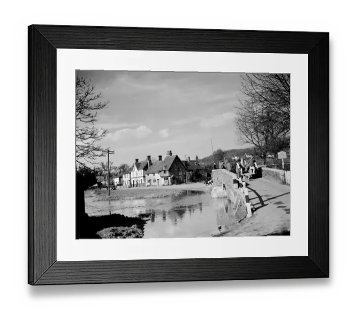Framed Print : A view of Eynsford over the River Darent with a milk cart going over the bridge Framed Print : A view of Eynsford over the River Darent with a milk cart going over the bridge