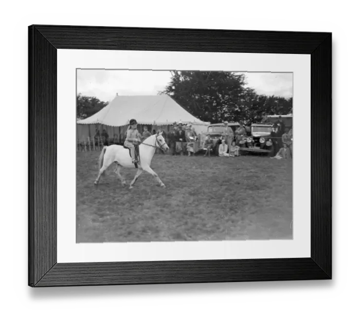 Framed Print : Little girl riding. 1934