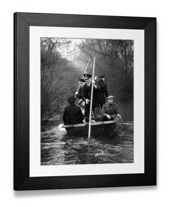 Framed Print : Thames Floods. Police of the Metropolitan River Squad brought a portable boat Framed Print : Thames Floods. Police of the Metropolitan River Squad brought a portable boat