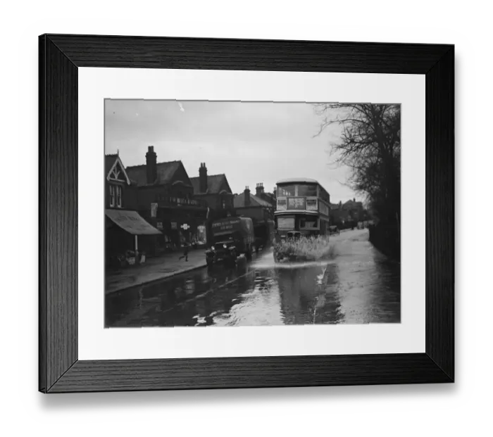 Framed Print : Flooded streets in Sidcup, Kent. Double dekker bus plows through the water Framed Print : Flooded streets in Sidcup, Kent. Double dekker bus plows through the water