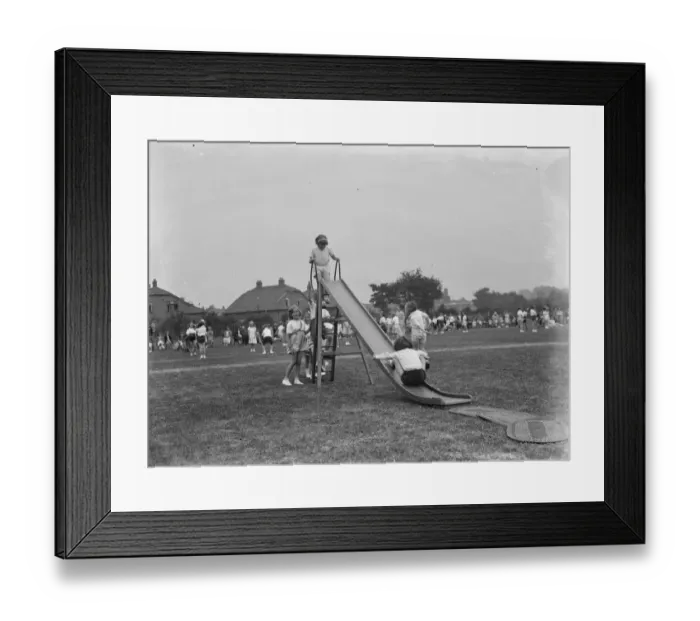 Framed Print : Sports day at the Days Lane Infant School in Sidcup, Kent. Children on the slide Framed Print : Sports day at the Days Lane Infant School in Sidcup, Kent. Children on the slide