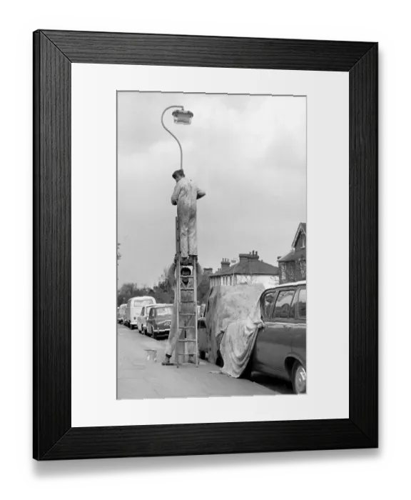 Framed Print : Courtesy Covers For Kerbside Cars. Workmen in a Sidcup Street in Kent. Painters carefully Framed Print : Courtesy Covers For Kerbside Cars. Workmen in a Sidcup Street in Kent. Painters carefully