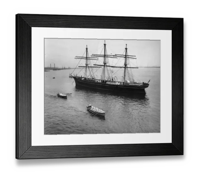 Framed Print : Naval cadets row to the training ship HMS Worcester in front of The Cutty Sark Framed Print : Naval cadets row to the training ship HMS Worcester in front of The Cutty Sark