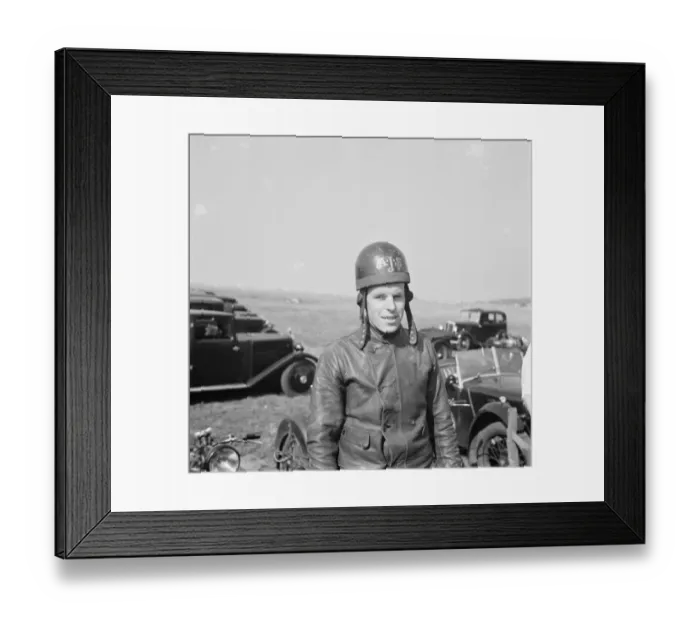 Framed Print : Motorcycle racing at Brands Hatch, Kent. A rider poses for a photo