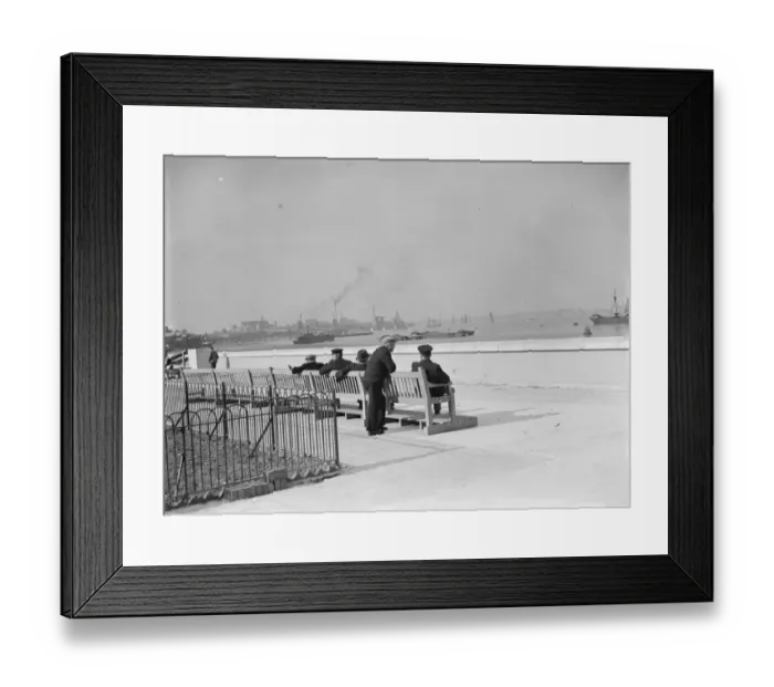 Framed Print : Men on benches enjoying the riversite view at Erith in Kent. 2 October 1937