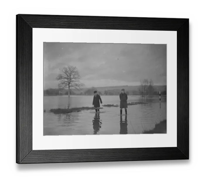 Framed Print : Two boys paddle through the floods in Yalding, Kent. 1936 Framed Print : Two boys paddle through the floods in Yalding, Kent. 1936