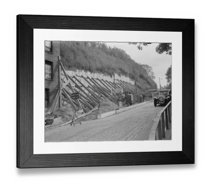 Framed Print : Shoring up a landslide with wooden braces in Dartford, Kent. 1938