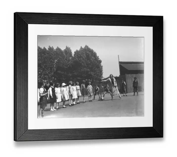 Framed Print : A woman playing stoolball with children in Hartley, Kent. 1937 Framed Print : A woman playing stoolball with children in Hartley, Kent. 1937