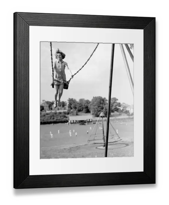 Framed Print : Girl on a swing in the park. 1939 Framed Print : Girl on a swing in the park. 1939