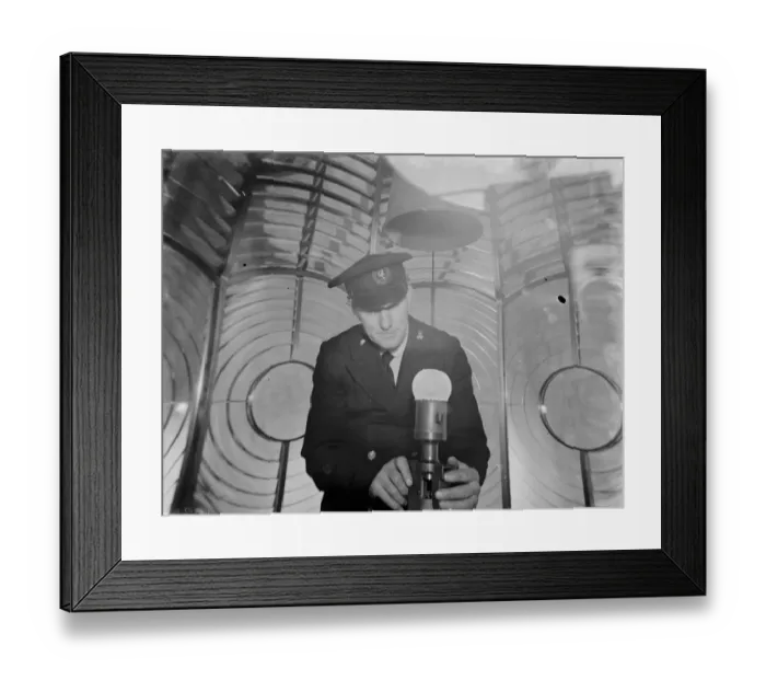 Framed Print : Lighthouse keeper J H Sole checks the Dungeness lighthouse bulb in the lantern room Framed Print : Lighthouse keeper J H Sole checks the Dungeness lighthouse bulb in the lantern room