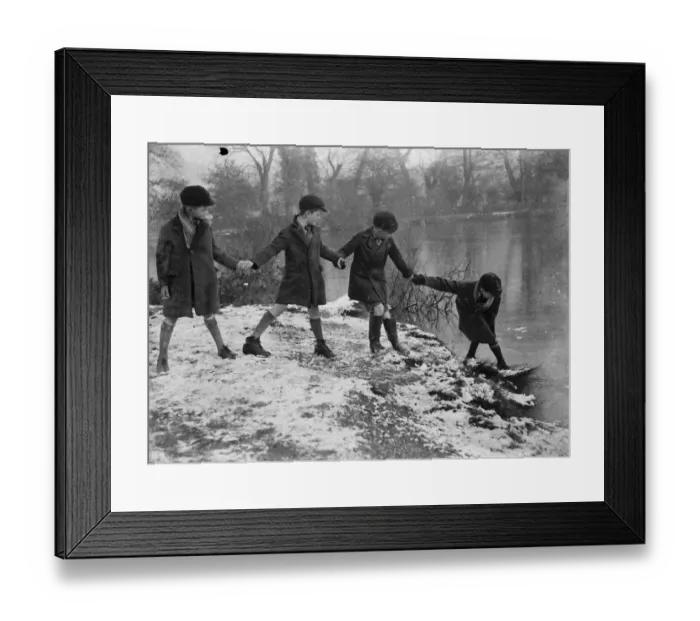 Framed Print : Children testing the ice. 1935 Framed Print : Children testing the ice. 1935