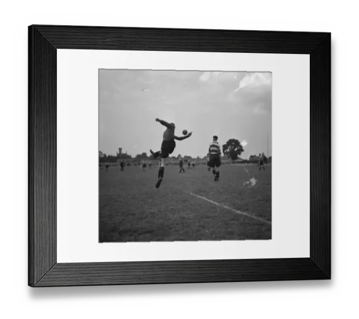 Framed Print : Dartford Football Club in action. The goalkeeper clears the ball Framed Print : Dartford Football Club in action. The goalkeeper clears the ball
