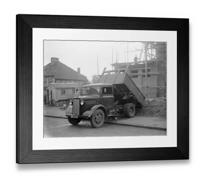 Framed Print : A Bedford truck tipping its load at a building site in Chislehurst, Kent Framed Print : A Bedford truck tipping its load at a building site in Chislehurst, Kent