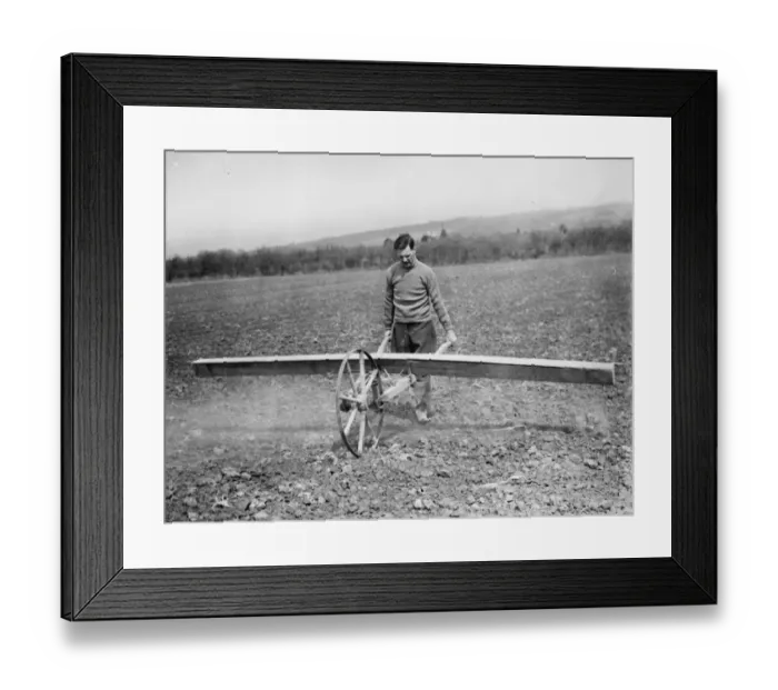 Framed Print : Farmer using a Coopers Drymac seed barrow. 1937 Framed Print : Farmer using a Coopers Drymac seed barrow. 1937