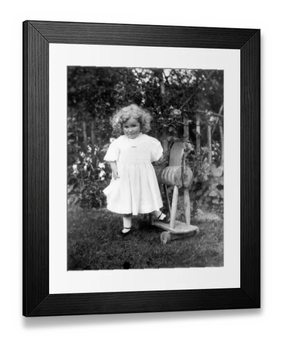Framed Print : Girl with wooden horse Framed Print : Girl with wooden horse