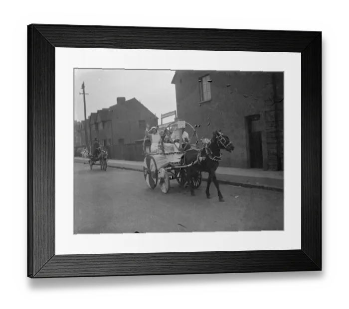 Framed Print : Nurses from the Livingstone Hospital parade through the street on a donkey cart as