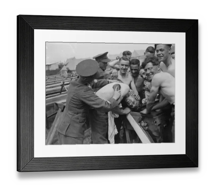 Framed Print : Territorial Army recruits at camp in Lympne, Kent. Washing in the open, a helping