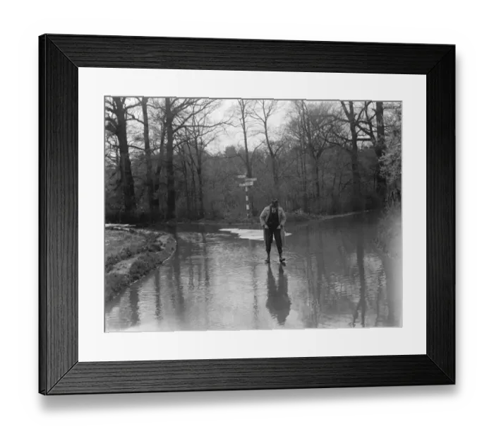 Framed Print : A man walks through the floods in Hockenden, Kent. 1937 Framed Print : A man walks through the floods in Hockenden, Kent. 1937