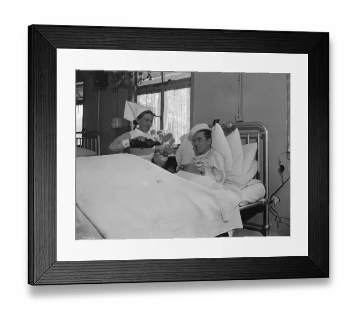 Framed Print : Celebrating Christmas at the Queens Hospital in Sidcup, Kent. Patient is poored Framed Print : Celebrating Christmas at the Queens Hospital in Sidcup, Kent. Patient is poored