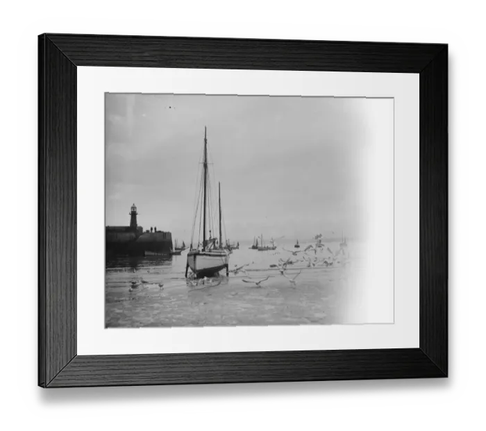 Framed Print : A sailing yacht stuck in the low tide mud waiting for the water to return