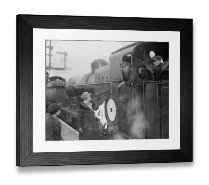 Framed Print : The Dartford Football Club mascot chats to the engine drivers en route to the match Framed Print : The Dartford Football Club mascot chats to the engine drivers en route to the match